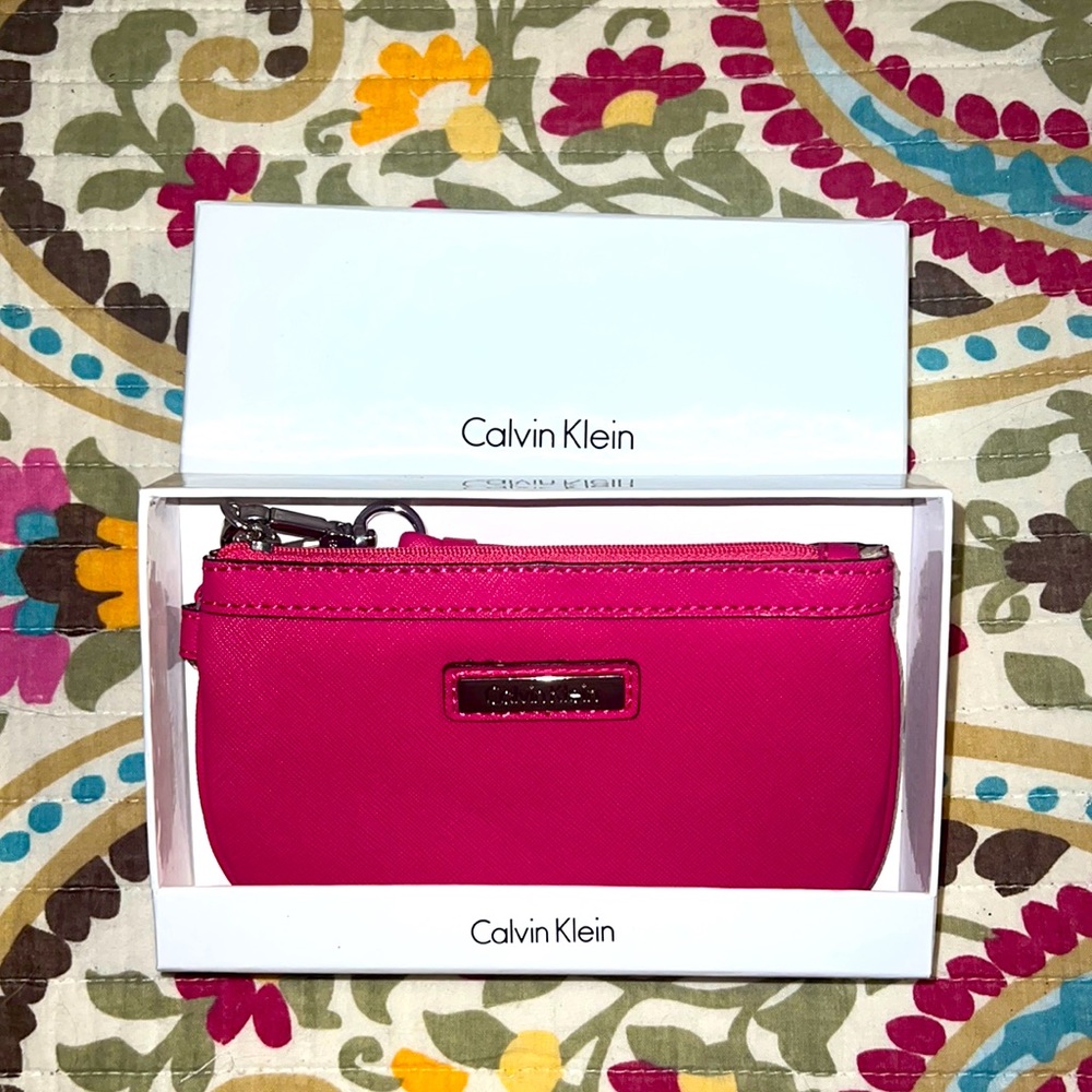 100% Authentic. Brand New Passion Pink Small CK Wristlet
